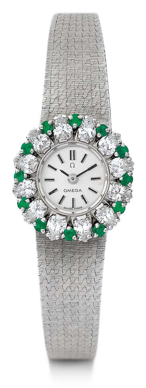 Omega, attractive diamond and emerald Lady's wristwatch.