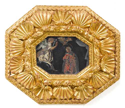 CARVED FRAME, WITH A DEPICTION OF THE ANNUNCIATION ON SHALE
