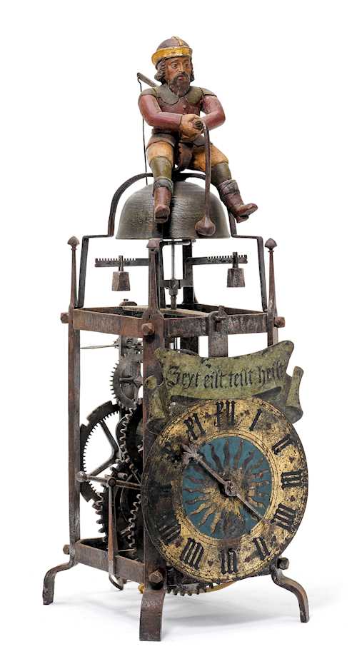 SMALL TOWER CLOCK WITH A FIGURE STRIKING THE BELL