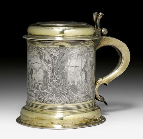 TANKARD WITH COVER,probably Germany 17th century. With later Viennese marks. Parcel gilt. Engraved with 3 cartouches and representations of gentlemen before city views. The cover with engraved coat of arms and crest. H 20cm, 1185 g.