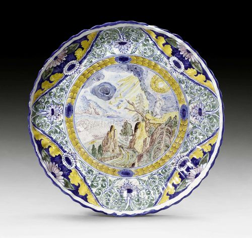FAIENCE PLATTER,Nuremberg circa 1720-30. Polychrome painted, probably by G.F. Grebner or Justus Alexander Gluer, with New Testament scene of 'Jesus on the Mount of Olives'. Without mark. Inventory number of the Germanisches Nationalmuseum in Nuremberg in red H.G. 2309. D 31cm