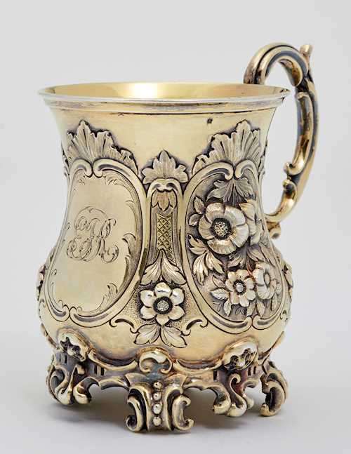 SMALL SILVER-GILT BEAKER WITH HANDLE