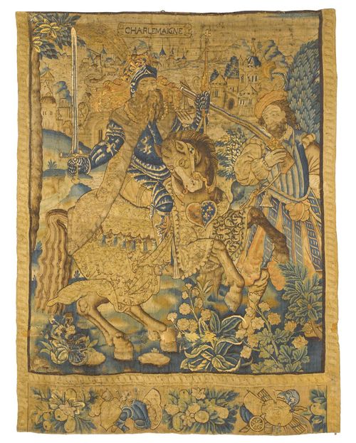TAPESTRY FRAGMENT "CHARLEMAGNE",Baroque, probably Flemish, 16th century. Depiction of Charles the Great on a horse. Border with floral and geometric pattern, not original. Some losses. H 260 cm. W 190 cm. Provenance: From a Swiss private collection.