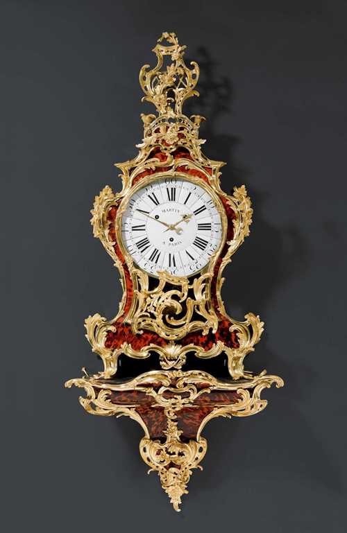 IMPRESSIVE RED TORTOISESHELL CLOCK WITH PLINTH,Louis XV, the case signed GOSSELIN (Antoine Gosselin, maitre 1752, or Adrien Antoine Gosselin, maitre 1772), the dial signed MARTIN A PARIS (Jean Martin, maitre 1746), Paris circa 1760. Red tortoiseshell and gilt bronze. Enamel dial. Verge escapement with 4/4 striking on 2 bells. Exceptionally rich, matte and polished gilt bronze mounts and applications, partly supplemented in the cresting. 74x35x169 cm. Provenance: - Sotheby's Monaco auction, 3.3.1990 (Lot No. 246). - T. and C. de Chirée collection, France. - Me Aguttes auction, Paris, 30.3.2011 (Lot No. 66).
