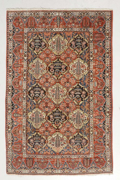 BACHTIAR old.Honeycomb patterned central field with plant motifs, red edging, 140x210 cm.