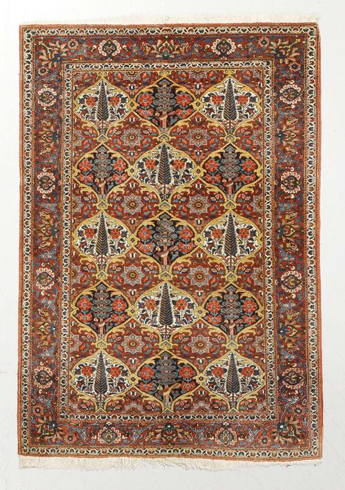 BACHTIAR antique.Central field patterned with colourful plant motifs, red border with trailing flowers, 145x200 cm.
