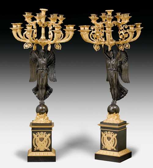 PAIR OF IMPORTANT TALL CANDELABRA "AUX VICTOIRES",Empire, signed P. CHIBOUST (Pierre Chiboust, active between 1806 and circa 1824), Paris circa 1810. Matte and polished gilt bronze with burnished bronze. H 116.5 cm. Provenance: - Sotheby's London auction, 24.11.1988 (Lot No. 1988). - Rosenberg & Stiebel, New York. - Private collection, New York. - Sotheby's New York auction on 21.4.2004 (Lot No. 124).