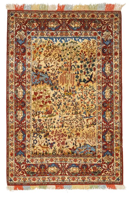 ISFAHAN.Beige central field, opulently patterned with animals and plants in harmonious colours, red edging with animal cartouches, stained, 147x225 cm.