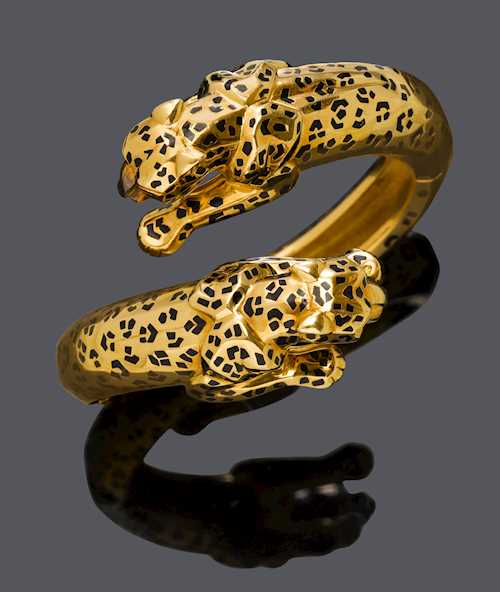 ENAMEL AND GOLD BANGLE, by CARTIER.