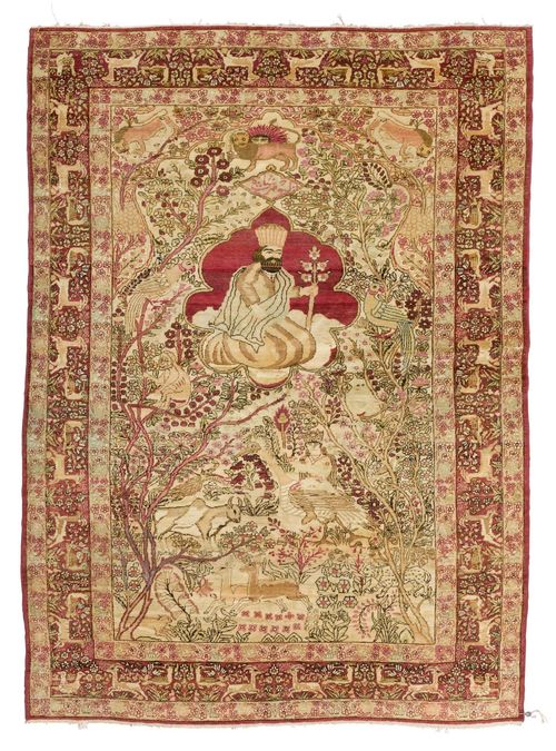 KIRMAN LAVER PICTORIAL CARPET antique.Light central field with a central medallion depicting a king, finely patterned with plants and animals in delicate pastel colours, red edging, in good condition, 140x215 cm.