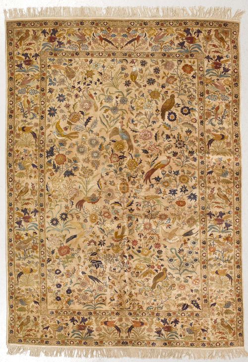 TABRIZ old.Beige ground, patterned throughout with flowers and birds in delicate pastel colours, beige edging, 145x223 cm.