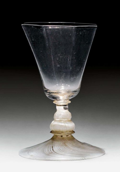 SMALL 'FACON DE VENISE' 'LATTICINO' WINE GLASS,17th century. Octagonal cuppa and baluster shaft. H 11.5 cm. Provenance: Gut Aabach, Risch am Zuger See.