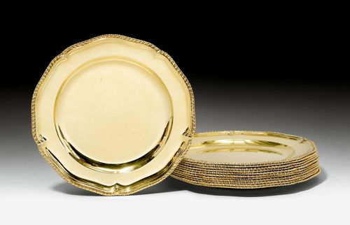 12 SILVER-GILT PLATES,London 1772/73. Maker's mark Robert Garrard. Rounded form with a fine gadrooned edge. Re-gilt. D ca. 24  cm, total weight 5320g.