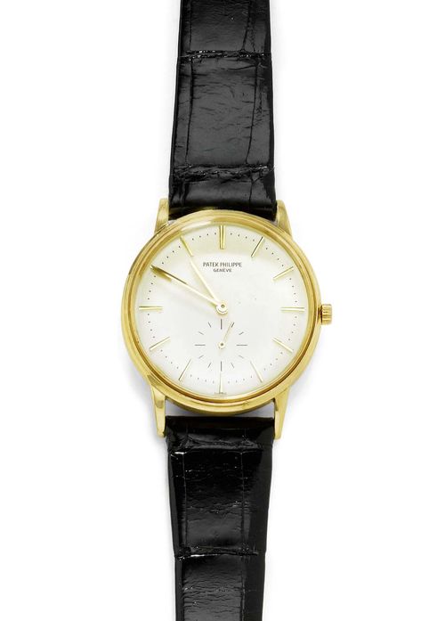 WRISTWATCH, AUTOMATIC, PATEK PHILIPPE CALATRAVA, 1970s. Yellow gold 750. Ref. 3425. Polished case No. 2.681.472 with matte-finished profile. Silver-coloured dial with appliqued gold-coloured indices and gold-coloured hands, small second at 6h. Automatic, lever movement No.  1.116.817, Cal. 27-460, with Breguet spring, Gyromax balance and gold rotor. Black leather band with gold-coloured clasp, not original. D 34 mm. With excerpt from the archives, August 2011.