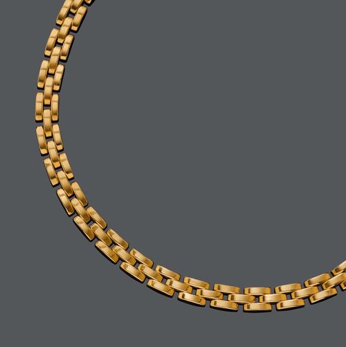 GOLD NECKLACE, CARTIER PANTHÈRE. Yellow gold 750, 70g. Classic, casual necklace with "grain-de-riz" pattern, signed Cartier, No. 740180. L ca. 43 cm. With original leather pouch.