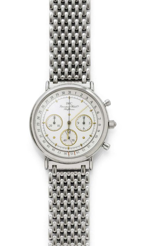 WRISTWATCH CHRONOGRAPH, IWC PORTOFINO, 1990s. Steel. Ref. 3731. Polished case No. 2469773, with round chrono pushers and screw-down back. Silver-coloured, textured dial with gold-coloured indices and luminous hands, 2 chrono counters and small second, outer date ring. Quartz movement No. 2449176, Cal. 630. Steel band with fold-over clasp. D 35 mm. With case and 1 extension link.