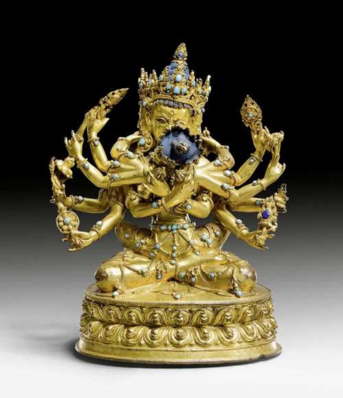 AN EXCELLENT GILT COPPER FIGURE OF GUHYASAMAJA YAB-YUM. Tibet, 15th/16th c. Height 17 cm. Sealed. ***This item is subject to special bidding conditions, please let us know if you wish to bid on it***