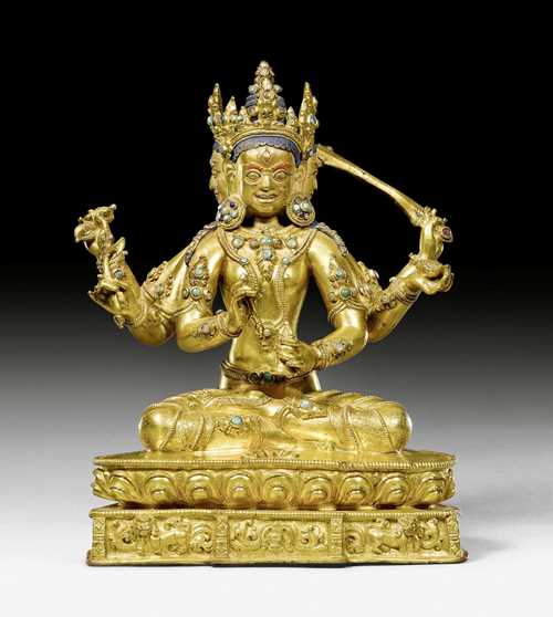 A RARE GILT COPPER ALLOY FIGURE OF JNANA DAKINI WITH RICH TURQUOISE INLAYS. Tibet, 16th/17th c. Height 21.8 cm.