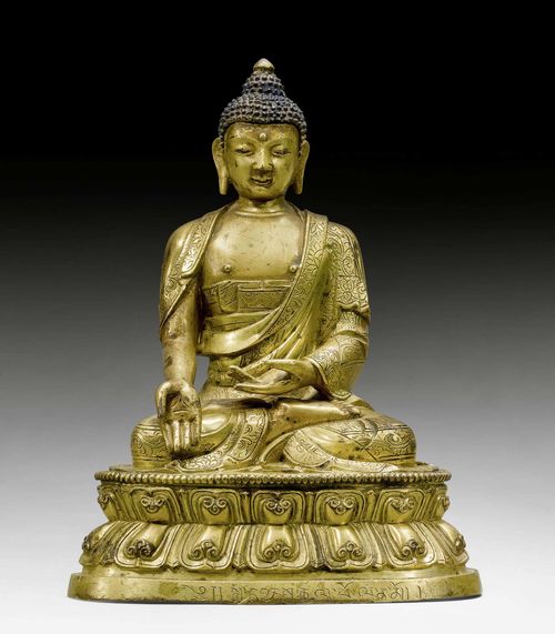 A GILT BRONZE FIGURE OF A BUDDHA WITH INSCRIPTION. Tibeto-chinese, around 1800, height 16 cm. Consecration plate lost.