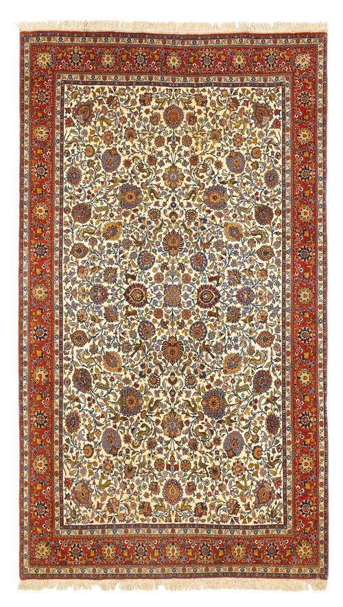 GHOM old.The white central field is patterned throughout with trailing flowers, palemttes and animal motifs. With a red border. Stained, otherwise good condition, 210x330 cm.