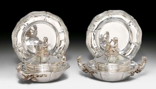 PAIR OF FRENCH VEGETABLE POTS WITH FIGURES,Paris, ca. 1850. Maker's mark Charles-Nicolas Odiot. On a présentoir from the same master, probably associated. Solid design. The cover crowned with a sculptured of a child playing with a goose. H ca. 21 cm, D présentoir 29 cm, 5470 g.