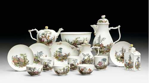 FINE TEA AND COFFEE SERVICE WITH PARFORCE AND EXOTIC HUNTING SCENES, Meissen, ca. 1760-1765. In its original case. Comprising: 1 case with later brass lock, 1 coffee pot and cover, 1 teapot and cover, 1 saucer, cover of a sugar bowl, 1 tea caddy and cover, 1 bowl, 6 coffee cups and saucers, 12 tea cups and saucers. The case lined with dark red leather, the lock later. Underglaze blue crossed-swords marks. Restorations. PLEASE NOTE: cover to milkjug replaced, 1 saucer a Vienna replacement, one cup and saucer with varied gilt rocaille decoration associated. Provenance: - Formerly in possession of a French branch of the Princes of Lobkowicz. - Swiss property.