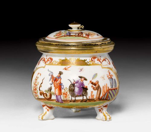 MEISSEN CREAM JUG WITH CHINOISERIE AND SILVER-GILT MOUNT, ca. 1725-28. The Augsburg silver-gilt mount by Elias Adam. Painted with chinoiserie figures, probably by J.G. Höroldt. Gold number 1. on the jug and the cover, maker's mark EA on the inside of the mount. H 11 cm. Gilding on the cover, finial and handle, slightly rubbed. Provenance: - Christie's London, 17 October 1977, Lot No. 10. - Christie's London, 11 December 2007, Lot No. 29. (Ringier Collection). - from a private Zurich collection.