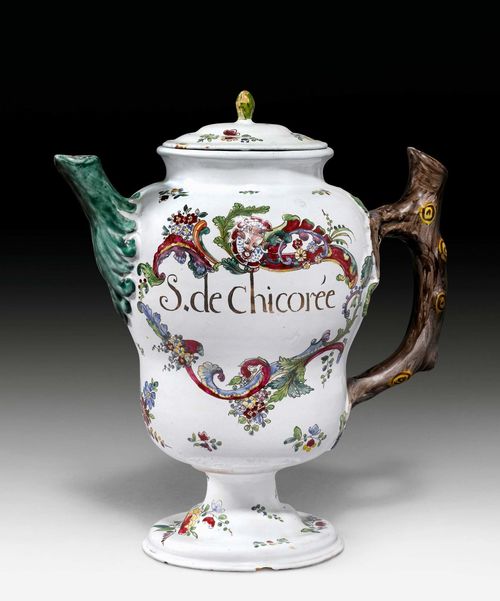RARE APOTHECARY JUG FROM THE ROYAL APOTHECARY IN LUNEVILLE,Luneville, factory of Jacques II Chambrette, circa 1750. Painted on both sides with a cartouche of rocailles, leaves and flowers crowned by an escutcheon with bull's head, the heraldic animal of the Polish Leszcynski noble family, and inscribed 'S. de Chicorée' in black. No mark. H 25 cm (28 cm). Associated cover, hairline crack at the mouth, small chip at foot edge.