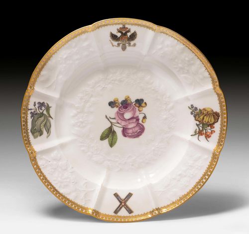 MEISSEN PLATE FROM THE ST. ANDREW'S SERVICE FOR TSARINA ELISABETH I. OF RUSSIA, Meissen, ca. 1744-45. The rim crowned with the Imperial double-headed eagle with the figure of St. Georg in the coat-of-arms. On the side: St. Andrew's cross S (Sanctus) A (Andreas) P (Patronus) R (Russiae) for the highest order of the Russian tsardom, on a blue ground. Underglaze blue sword mark, press number 16. Inventory No. of the State Hermitage Museum 1657 in red. D 24.3 cm. Provenance: - a present from Frederick August II., Elector of Saxony, as August III., King of Poland, to Tsarina Elisabeth I. of Russia. - in the private chambers of Tsarina Elisabeth from July up to November 1745. - in the Winter Palace, in the chambers of the Imperial Chamberlain from the end of 1745 onwards. - archived under Inventory No. 1657 in the State Hermitage  Museum since 1911. - handed over to the 'Antiquariat' in March 1930. - from a Zurich private collection.