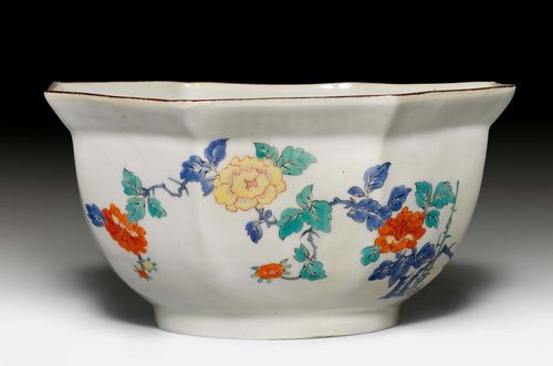 RARE MEISSEN BOWL FROM THE JAPANESE PALACE,Meissen, ca. 1730. Johanneum number 'N=255w'. Painted in the Kakiemon style with iron-red chrysanthemums and yellow peony blossoms. Enamel-blue swords with curved guards, incised and blackened Johanneum No. 'N=255w', embosser sign K incised. D 20.5 cm, H 10 cm. Provenance: - Antiquitätenhandel Dresden, up until 1974. - from a Dresden private collection up until 1993. - from a Zurich private collection.