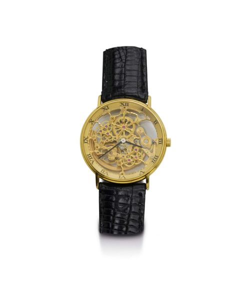 WRISTWATCH, AUTOMATIC, IWC SKELETON MOVEMENT, 1990s. Yellow gold 750. Round, flat, skeleton case. Gold numeral ring with Roman numerals, black hands. Finely engraved movement No. 2355921, Cal. 2317, with open-worked rotor. Black leather band with gold IWC clasp. D 33 mm.