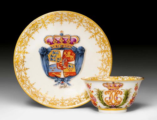 IMPORTANT MEISSEN TEABOWL AND SAUCER FROM THE SERVICE OF KING CHRISTIAN VI., KING OF DENMARK, Meissen, ca. 1730-1735. Teabowl with crowned monogram of Christian VI. The saucer painted with the royal coat-of-arms of Denmark, crowned by a purple-lined royal crown. Underglaze blue sword mark, gilder's number 1 on both pieces. Incised mark / in the base rings. D saucer 12.7 cm, D teabowl 8 cm, H 4.5 cm. (2) Provenance: - a present from Augustus the Strong, King of Poland and Elector of Saxony, to King Christian VI. of Denmark. - Queen Sophie Magdalene of Denmark (1700-1770), Christiansborg Castle, Copenhagen up until 1764. - Rosenborg Castle, Copenhagen, 1795-1797. - sold in 1797 as part of a lot due to a fire in Christiansborg Castle in 1795. - Christie's London, 1 December 1986, Lot Nos. 176-188 (pieces of the service) - Kunsthandel Röbbig, Munich. - from a Zurich private collection.
