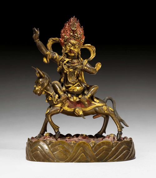 A PARTLY GILT BRONZE FIGURE OF PALDEN LHAMO WITH RED COLOURED DETAILS. Tibet, 19th c. Height 18.5 cm.