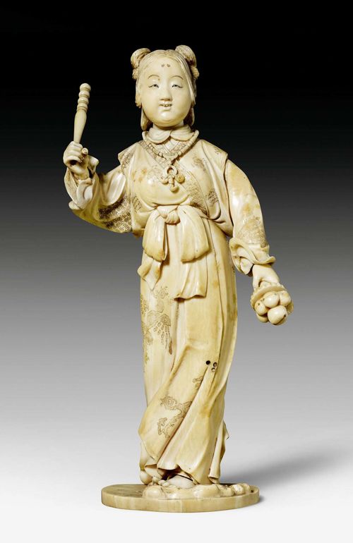 AN IVORY OKIMONO OF A DANCING LADY. Japan, Meiji period, height 26 cm. Signed. Minor damages.