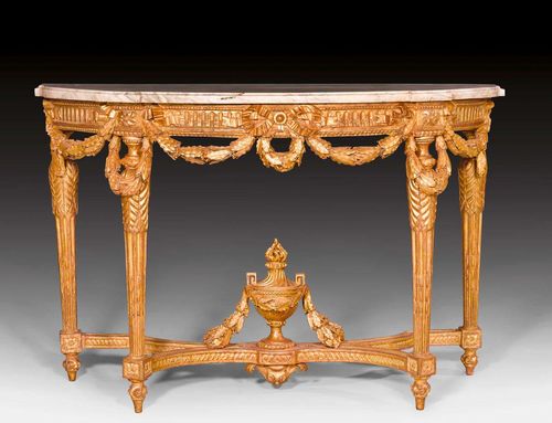 IMPORTANT CONSOLE "AUX GUIRLANDES",Louis XVI, attributed to G. JACOB (Georges Jacob, maitre 1765), Paris circa 1770/75. Fluted, pierced and exceptionally finely carved gilt wood. Rectangular, profiled gray/white speckled marble top. 128x52x89 cm.
