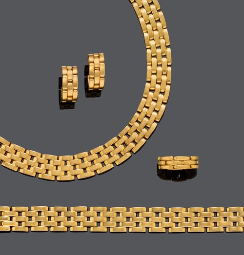 GOLD NECKLACE WITH BRACELET,  EARCLIPS AND RING,  BY CARTIER.