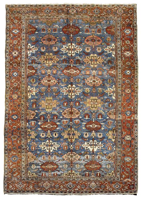 HERIZ SERAPI antique.Blue central field patterned throughout with stylised blossoms. Red border with trailing flowers. Small areas restored. Signs of wear. 275x395 cm.