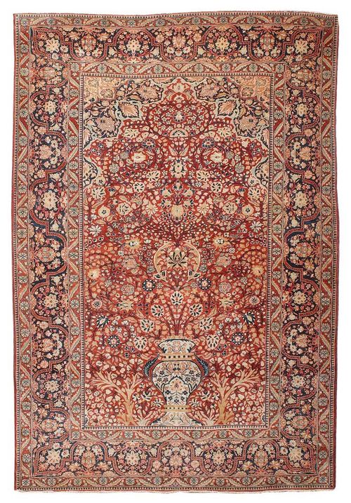 KESHAN MOHTASCHEM antique.Attractive collector's item in very good condition, with a red central field decorated with a vase surrounded by trailing flowers in attractive pastel colours, black border, 195x132 cm.