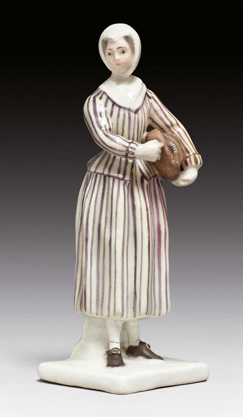 SMALL STREET VENDOR FIGURE OF A HURDY GURDY PLAYER, ZURICH, MODEL CIRCA 1772.Form 172. Impressed mark 2, incised marks A H C. H 9.4 cm. Hurdy gurdy restored, fire cracks in both ankles. Provenance: Dr. Segal, Basel, 1977. Comparable piece: Ducret II, ill.167 (Paul Schnyder von Wartensee collection).