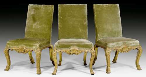 SET OF 3 CHAIRS "A LA REINE",George I, England circa 1720. Richly carved and gilt wood. Worn, green velour covers. 62x43x49 cm.