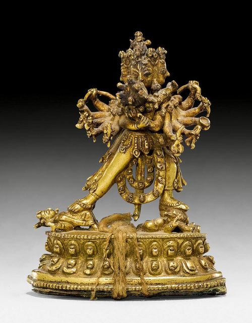 A MINIATURE GILT COPPER ALLOY FIGURE OF CAKARASAMVARA YAB-YUM. Nepal, 17th/18th c. Height 7.5 cm. Seal fixed with thread.