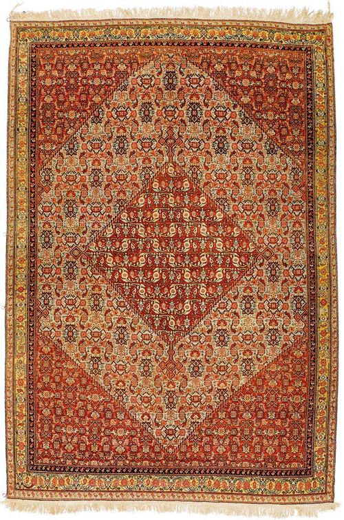 SENNEH antique.Attractive collectors' item  in very good condition. Red ground, finely patterned with stylized flowers in turquoise and pink, yellow border, 205x140 cm.