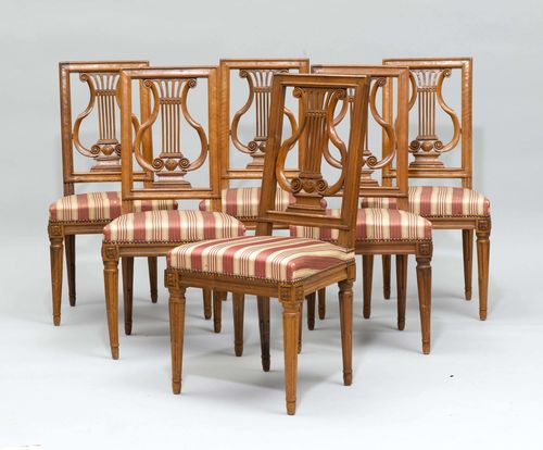 SUITE OF 6 CHAIRS,late Louis XVI, Switzerland. Walnut, carved with rosettes. Open-worked backrest. Dark red/beige striped fabric cover.