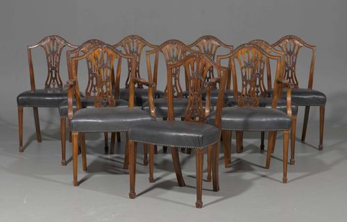 SUITE OF 8 CHAIRS AND 2 ARMCHAIRS,in the style of Hepplewhite, end of the 19th century. Mahogany, carved with ears of wheat, flowers, leaves and volutes. Open-worked, curved backrest. Black leather cover.
