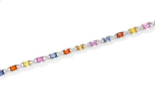 SAPPHIRE AND DIAMOND BRACELET. White gold 750. Decorative bracelet of 12 oval sapphires in pink, yellow, orange and blue weighing 16.85 ct, connected to one another by diamond-set cross motifs with a total of 168 brilliant-cut diamonds weighing ca. 1.16 ct. L ca. 19 cm.
