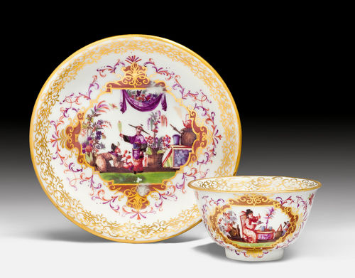 CUP AND SAUCER WITH CHINOISERIE DECORATION.
