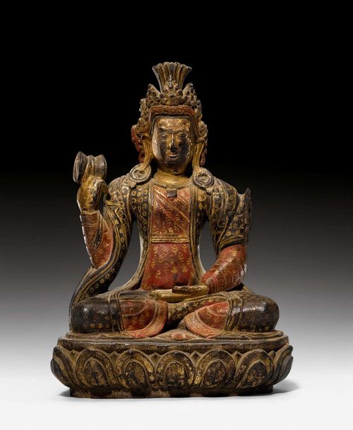 MALE DEITY.Nepal, 19th c. H 19.5 cm. Wood with polychrome painting. The peaceful deity adorned as a Bodhisattva holds in his right hand a Damaru drum, the left lies open on the sole of his foot. Light damage.