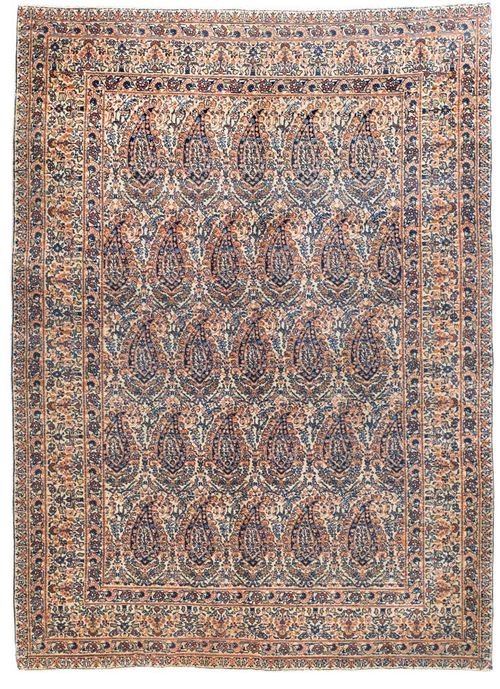 KIRMAN antique.White central field, finely patterned with boteh motifs in delicate pastel colours, white border, good condition, 194x135 cm.