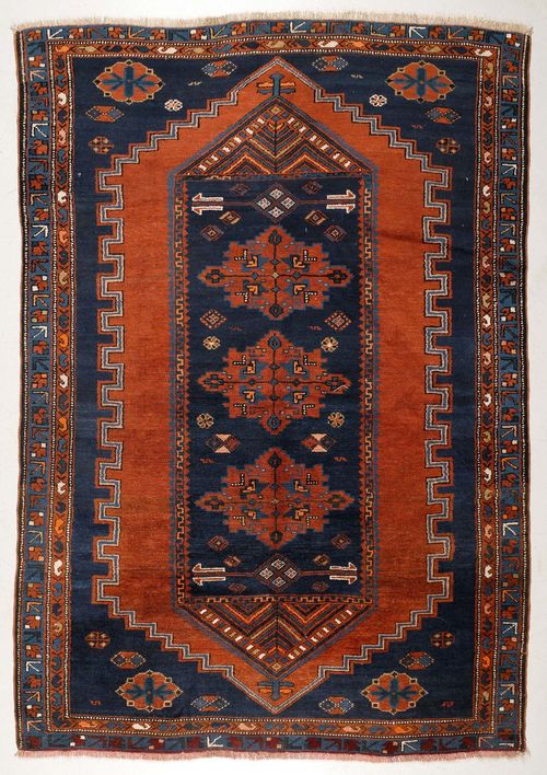 KAZAK old Blue ground with a bulky central medallion in rust-red and blue, geometrically patterned, narrow border, slight wear, 160x242 cm.