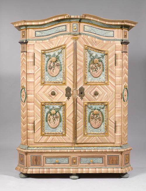 PAINTED CUPBOARD, Austria, probably Salzburger Land, beginning of the 19th century. Pine, painted and partly marbled, in part carved with flowers and laurel wreath. Front with double-doors. Brass mounts. 165x69x201 cm. 1 key. In part re-painted or paint later. Provenance: Gut Aabach, Risch am Zugersee.